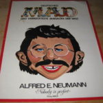 Mad Werbeposter mit Alfred E.Neumann Gesicht