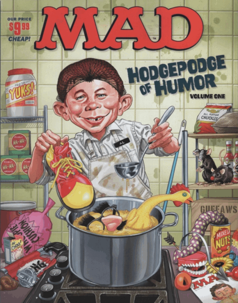 Das Cover zeigt ein chaotisches, farbenfrohes Kunstwerk von Tom Richmond im typischen MAD-Magazin-Stil: Ein verrückter Charakter mit übertriebenem Gesichtsausdruck – wahrscheinlich der ikonische MAD-Alfred E. Neuman – grinst frech, während um ihn herum absurde Szenen und Running Gags aus der MAD-Welt verstreut sind. Im Hintergrund sind Anspielungen auf klassische Rubriken wie 'Spy vs. Spy' und 'The Lighter Side of...' zu erkennen, alles eingebettet in ein dynamisches Layout mit schrägen Schriftzügen und satirischen Details. Das Design kombiniert Retro-Charme mit moderner Comic-Ästhetik und lädt dazu ein, sofort ins anarchische Vergnügen einzutauchen.