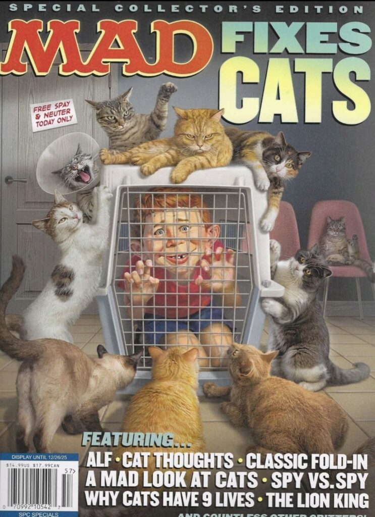 Cover der MAD Magazin Sonderausgabe 2025 „Mad Fixes Cats“ mit Alfred E. Neuman in einer Katzenbox, umringt von neugierigen Katzen.